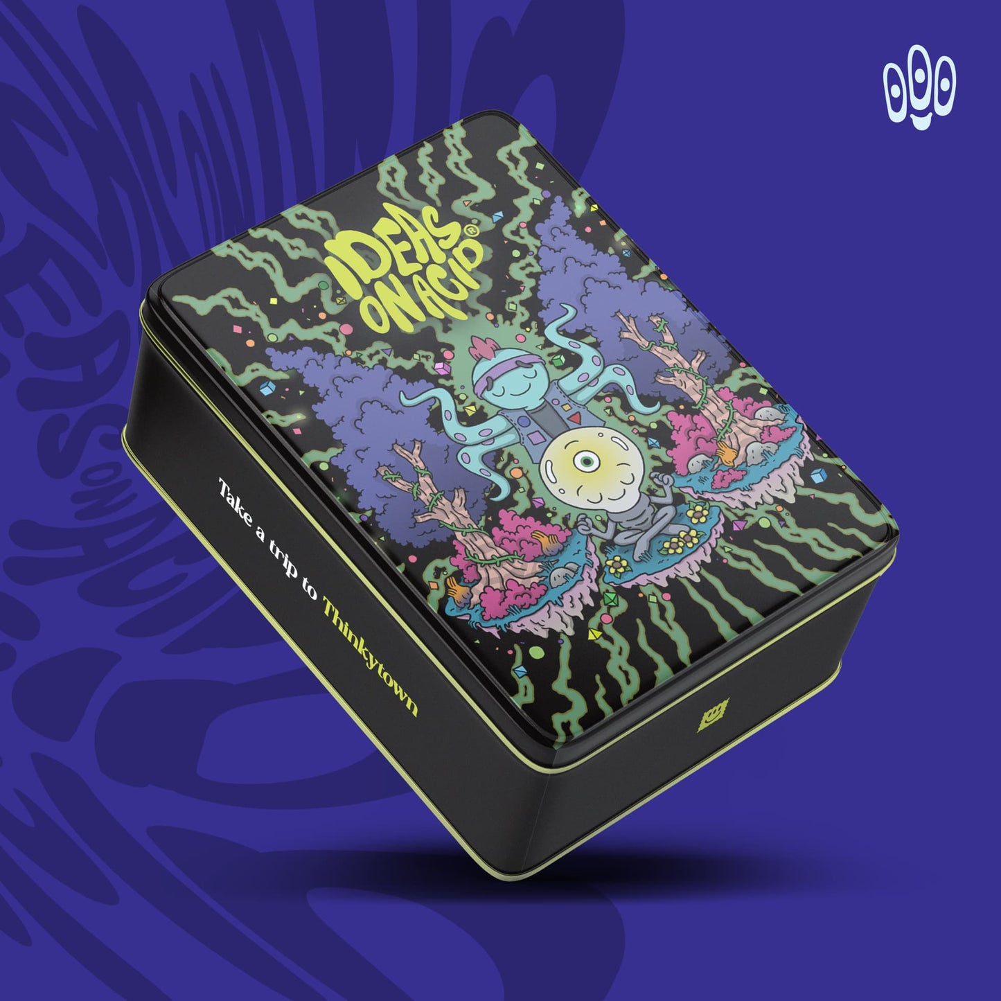 A black tin box with a colourful illustration on the lid depicting quirky creatures and characters in a surreal, psychedelic style. The box is titled "Ideas on Acid" and has the tagline "take a trip to thinkytown" printed on it