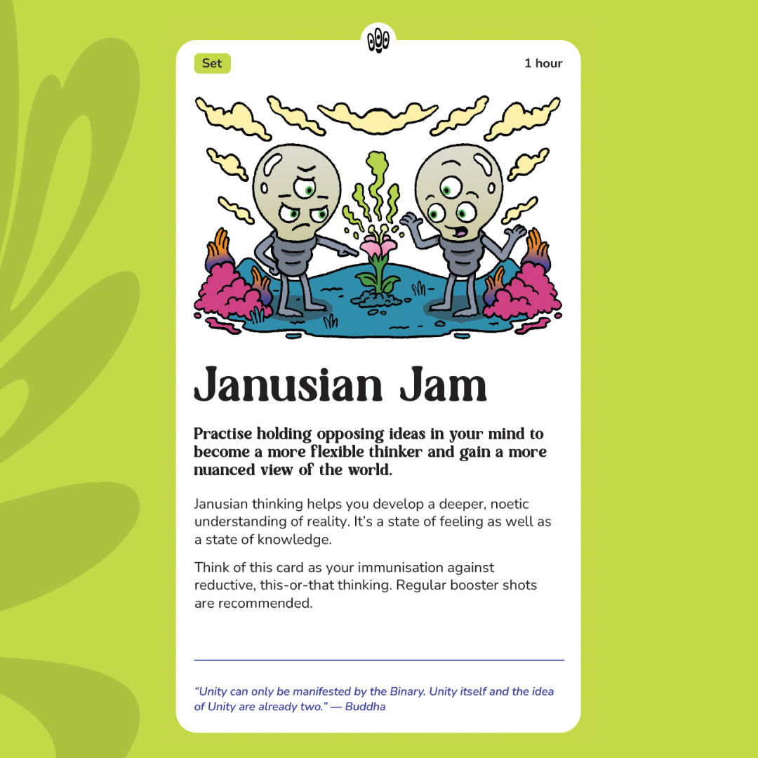 A card titled "Janusian Jam" depicts two cartoonish figures, each with two faces, standing on a small island with colorful plants. The card suggests practicing holding opposing ideas in your mind to become a more flexible thinker and gain a nuanced view of the world. It explains that Janusian thinking helps develop a deeper understanding of reality and serves as immunization against reductive thinking. The card recommends regular booster shots of this practice. 